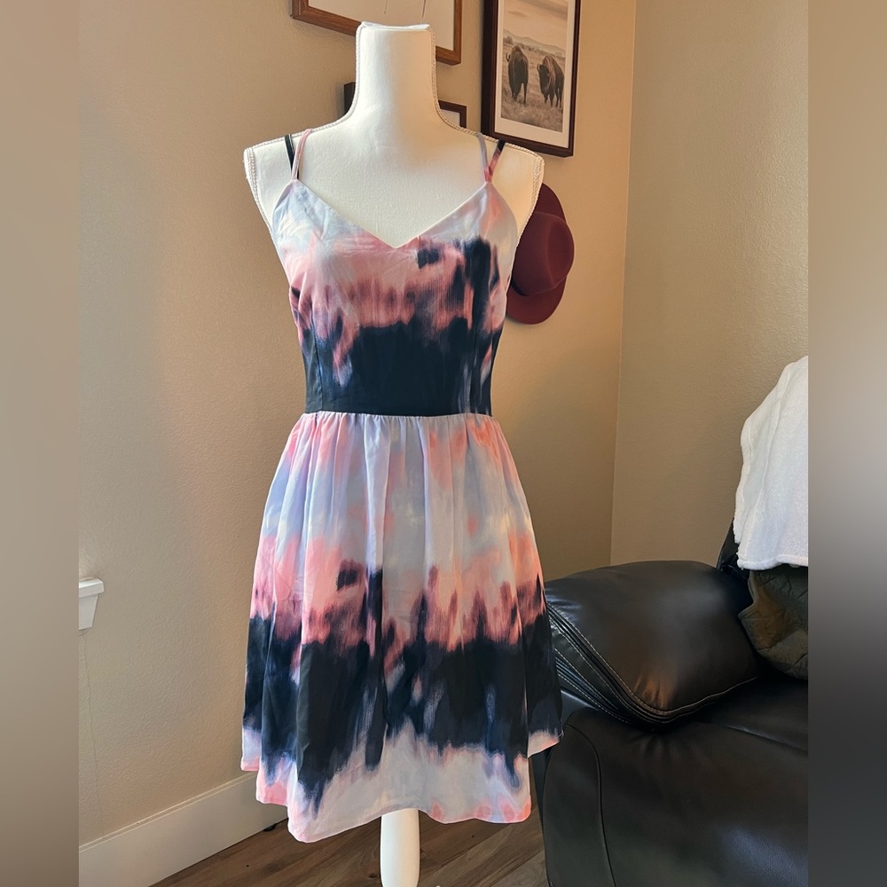 Jane Mini Dress. Medium fit. Tie back with zipper. Fun colors, liner. Boutique